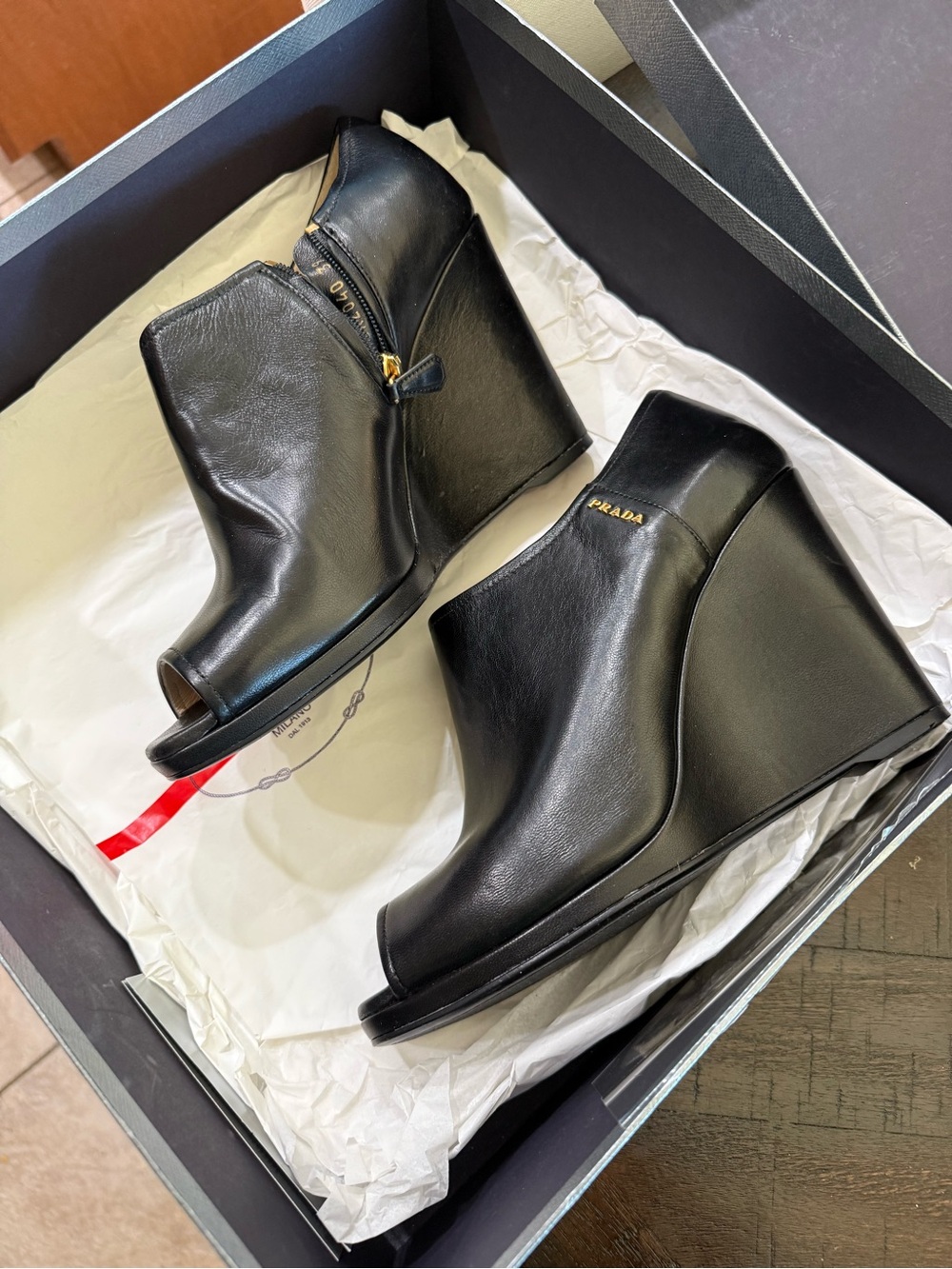 Prada Black Leather Peep-Toe Wedge Booties with Gold Logo